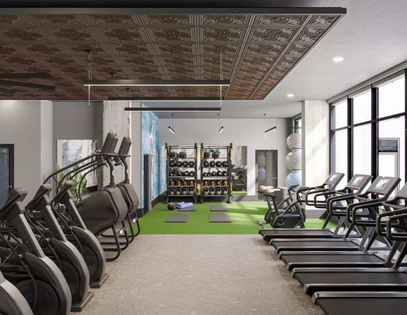 cardio area with weights in fitness center
