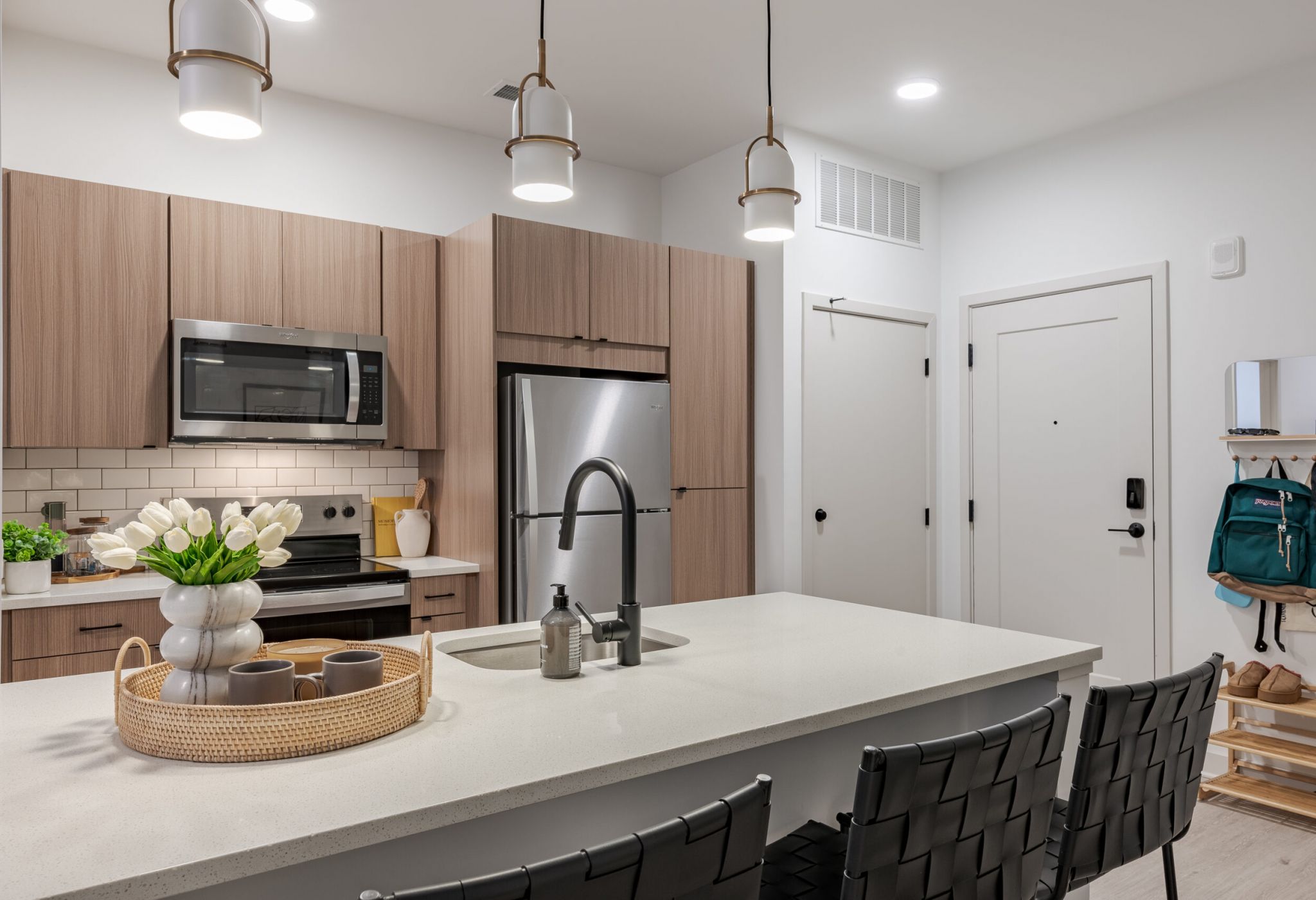 Rendering of VERVE West Lafayette student apartment kitchen with kitchen island and designer cabinetry